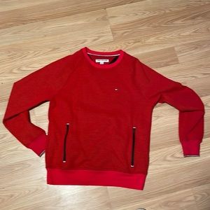 Red Tommy Hilfiger sweatshirt. Is a size s/p